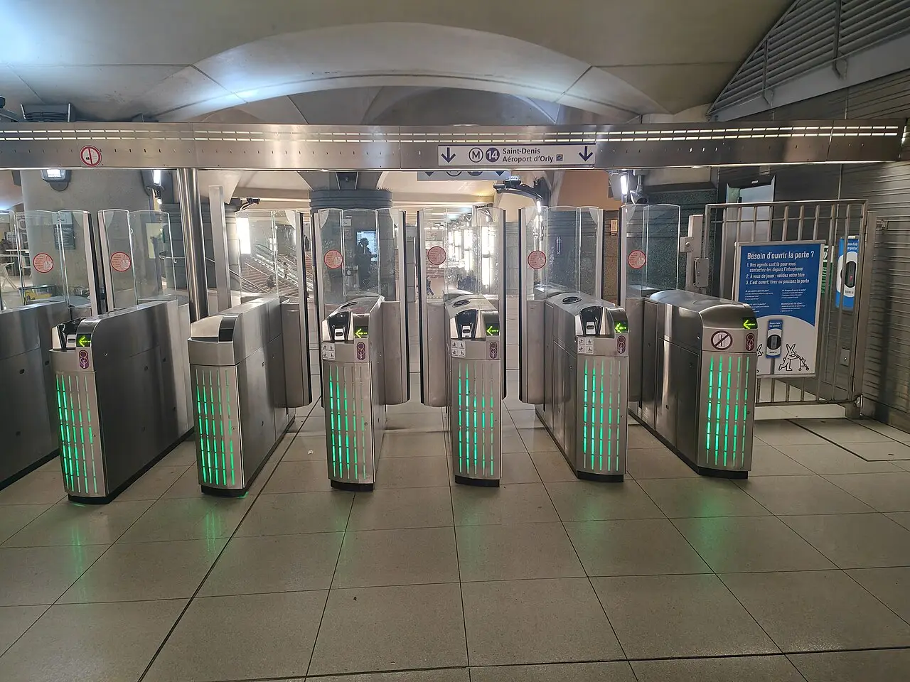 Row of automatic access control gates with card readers